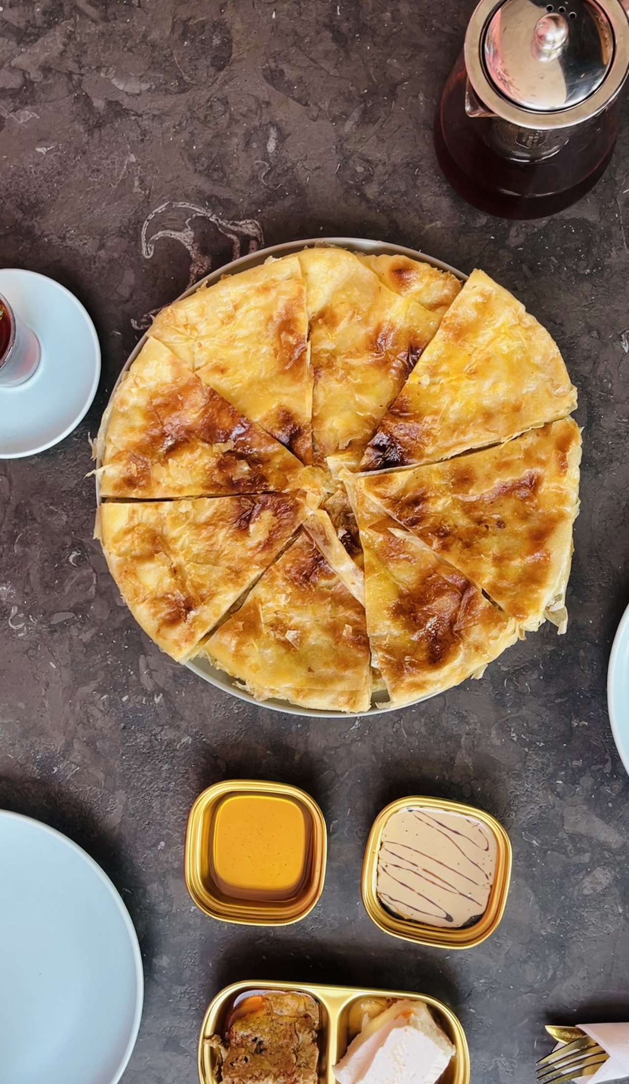 Large feter with cheese, honey and old cheese with a pot of mint tea for two persons